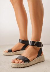 Czarne Sandały VICES na Niskim Koturnie z Plecionki z Paskiem Wokół Kostki Tetea. Czarne sandały damskie Born2be, bez wzorów, bez obcasa, na koturnie, bez zapięcia. Za 99.99 zł.