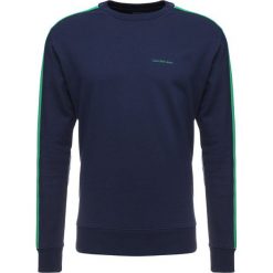 Calvin Klein Jeans SIDE STRIPE Bluza dark blue. Bluzy męskie marki Calvin Klein Jeans. W wyprzedaży za 356.85 zł.