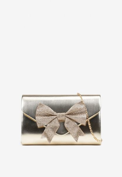 Złota Torebka Kopertówka na Łańcuszku z Cyrkoniową Kokardą Erfelia. Żółte kopertówki damskie Born2be, z aplikacjami, klasyczne, małe, zdobione, bez dodatków. Za 49.99 zł.