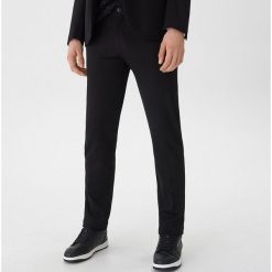 Spodnie garniturowe slim fit - Czarny. Eleganckie spodnie męskie marki Giacomo Conti. Za 129.99 zł.