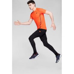Koszulka treningowa męska TSMF273 - pomarańcz. Koszulki sportowe męskie 4f, m, bez wzorów, z dzianiny, bez kołnierzyka. W wyprzedaży za 39.99 zł.