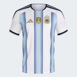 Koszulka Argentina 26 Home. Białe koszulki sportowe męskie Adidas, bez wzorów, bez kołnierzyka, bez ramiączek, do piłki nożnej, climacool (adidas). Za 439.00 zł.
