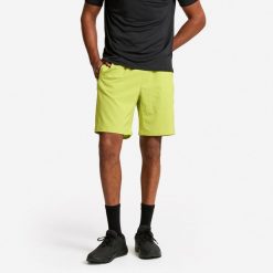 Spodenki fitness cardio męskie Domyos. Zielone krótkie spodenki sportowe męskie DOMYOS, l, bez wzorów, z materiału, na fitness i siłownię. Za 49.99 zł.