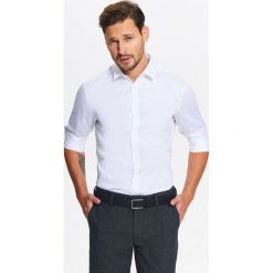 KOSZULA MĘSKA ELEGANCKA Z JEDWABISTYM WYKOŃCZENIEM TKANINY O DOPASOWANYM KROJU. Koszule męskie marki TOP SECRET. W wyprzedaży za 39.99 zł.