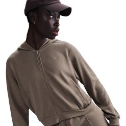Kurtka damskie Nike Sportswear marrone. Brązowe kurtki sportowe damskie Nike, l, bez wzorów, z bawełny, bez kaptura, trekkingowe. Za 335.95 zł.