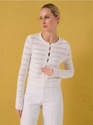 Bawełniany kardigan - kremowy. Białe kardigany damskie Sinsay, l, bez wzorów, z bawełny. Za 49.99 zł.