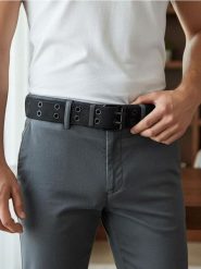 Regulowany pasek z metalowymi oczkami - czarny. Czarne paski damskie Sinsay, bez wzorów. Za 19.99 zł.