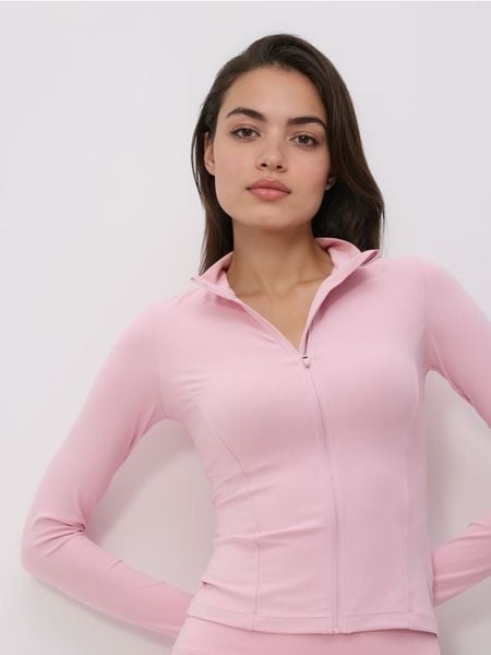 Bluza z suwakiem - pastelowy róż. Czerwone bluzy damskie Reserved, l, bez wzorów, z dzianiny, bez kaptura. Za 99.99 zł.