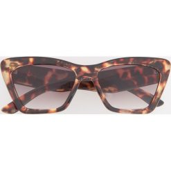 Okulary przeciwsłoneczne - Brązowy. Okulary przeciwsłoneczne damskie marki QUECHUA. Za 49.99 zł.