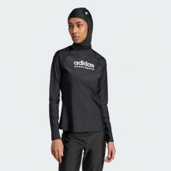 Koszulka Long Sleeve Rash Guard. Czarne koszulki sportowe damskie Adidas, m, bez wzorów, z materiału, sportowe, bez kołnierzyka. W wyprzedaży za 186.10 zł.