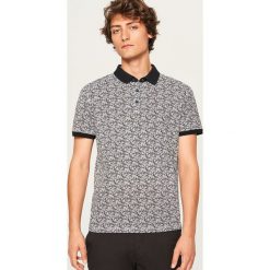 Koszulka polo z nadrukiem - Biały. Białe koszulki polo męskie Reserved, z nadrukiem. Za 59.99 zł.