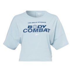 Koszulka damska Reebok Les Mills® BodyCombat® Activchill. Niebieskie koszulki sportowe damskie Reebok, m, bez wzorów, z tkaniny, bez kołnierzyka, bez ramiączek, na fitness i siłownię. Za 113.00 zł.