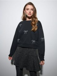 Prążkowana spódnica mini - czarny. Czarne spódnice damskie Sinsay, l, bez wzorów, prążkowane, mini. Za 29.99 zł.