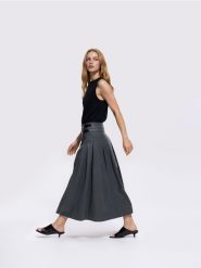 Spódnica midi z lyocellem - ciemnozielony. Zielone spódnice damskie Reserved, l, bez wzorów, z lyocellu, midi, rozkloszowane. Za 159.99 zł.