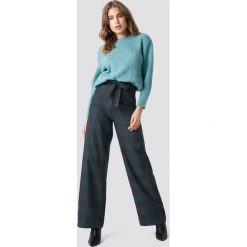 Trendyol Szerokie spodnie w kratkę - Grey. Spodnie materiałowe damskie marki Trendyol. Za 100.95 zł.