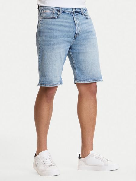 Calvin Klein Jeans Szorty jeansowe LV04RF920G Niebieski Regular Fit. Niebieskie szorty męskie Calvin Klein Jeans, m, bez wzorów, z jeansu. Za 329.99 zł.