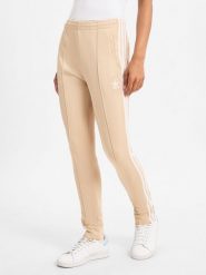 Adidas Originals spodnie do biegania Kobiety beżowy, XS. Brązowe spodnie sportowe damskie adidas Originals, xs, bez wzorów, do biegania. Za 299.95 zł.