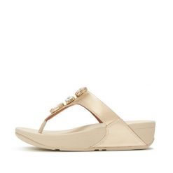 Klapki z platformą z palcem u nogi damskie FitFlop Lulu Ultra-Jewel Metallic. Szare klapki damskie FIT FLOP, bez wzorów, z materiału, eleganckie, bez obcasa, na koturnie. Za 596.50 zł.