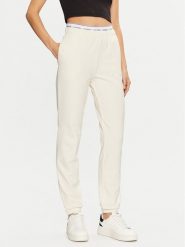 Guess Spodnie dresowe O5RB01 KCO31 Écru Regular Fit. Spodnie dresowe damskie Guess, xl, z aplikacjami, z bawełny. Za 179.99 zł.