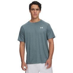 Koszulka Under Armour Tech Textured. Białe koszulki sportowe męskie Under Armour, l, bez wzorów, z materiału, bez kołnierzyka, bez ramiączek, na fitness i siłownię. Za 151.30 zł.