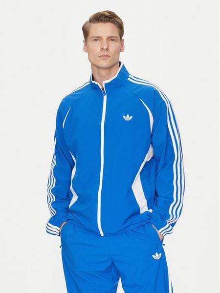Adidas Bluza adicolor Teamgeist JP1117 Niebieski Regular Fit. Niebieskie bluzy męskie Adidas, m, bez wzorów, z syntetyku, bez kaptura. Za 329.99 zł.