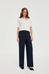 Spodnie z szerokimi nogawkami granatowe. Spodnie materiałowe damskie MOODO, l, bez wzorów, z elastanu. Za 149.99 zł.