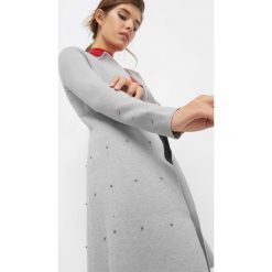 Kardigan z perełkami. Zielone kardigany damskie Orsay, z dzianiny. Za 139.99 zł.