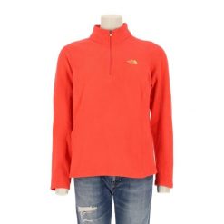 Damski sweter polarowy TNF koralowy. Brązowe swetry damskie The North Face, l, bez wzorów, z polaru, sportowe, bez kołnierzyka, bez ramiączek, bez kaptura. Za 127.76 zł.