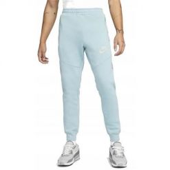 Spodnie sportowe męskie Nike DO7232494. Niebieskie spodnie sportowe męskie Nike, m, bez wzorów, z dresówki, na fitness i siłownię. Za 251.00 zł.