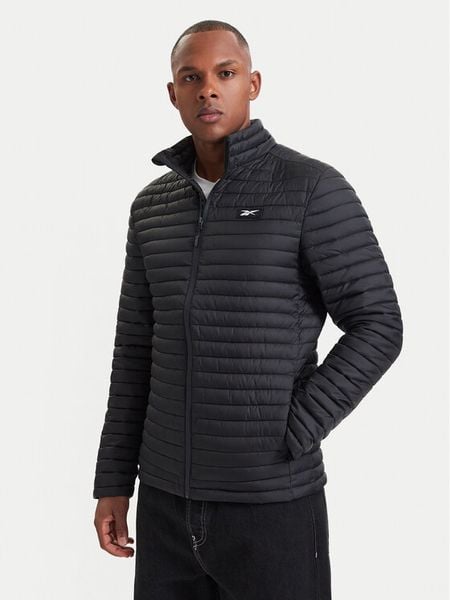 Reebok Kurtka przejściowa RCC00085 Czarny Regular Fit. Czarne kurtki męskie Reebok, m, bez wzorów, z syntetyku, bez kaptura. Za 242.99 zł.