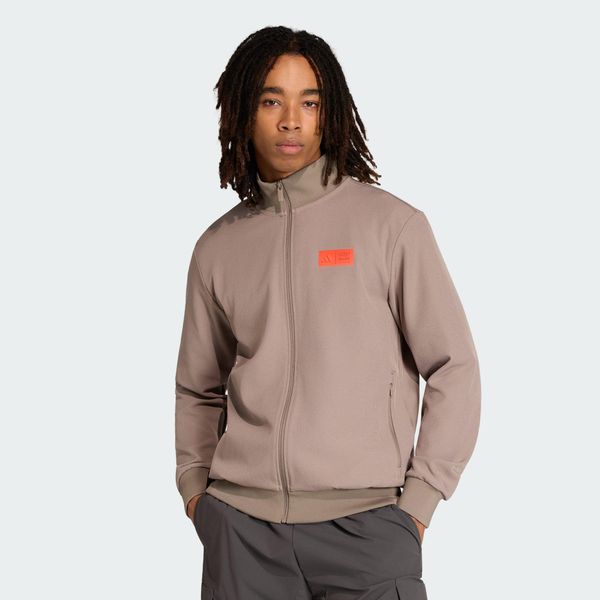 BLUZA DRESOWA AUDI REVOLUT F1 TEAM ELEVATED. Brązowe bluzy męskie Adidas, l, bez wzorów, z dresówki, bez kaptura, do piłki nożnej. Za 529.00 zł.