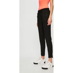 Tally Weijl - Spodnie. Czarne legginsy damskie marki TALLY WEIJL, bez wzorów, z tkaniny. Za 69.90 zł.
