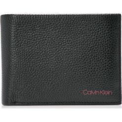Calvin Klein - Portfel skórzany. Czarne portfele męskie Calvin Klein, z materiału. W wyprzedaży za 259.90 zł.