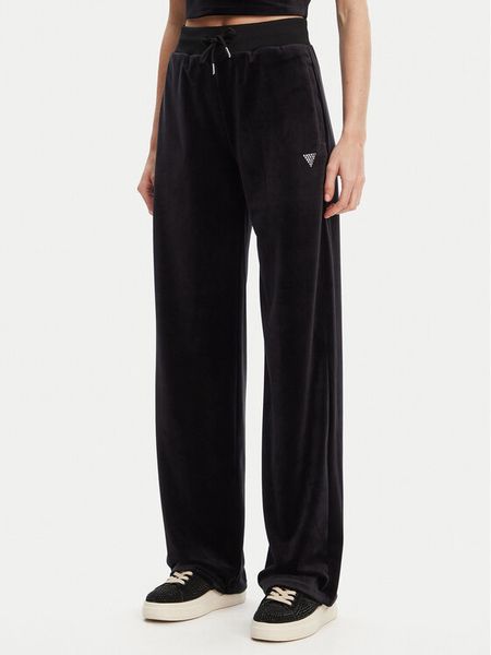 Guess Spodnie dresowe V3BB26 K0232 Czarny Regular Fit. Czarne spodnie dresowe damskie Guess, xxs, z aplikacjami, z dresówki. Za 250.99 zł.
