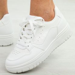 Białe sportowe buty damskie McBraun 23263. Białe obuwie sportowe damskie McBraun, bez wzorów, ze skóry, na fitness i siłownię. Za 99.00 zł.