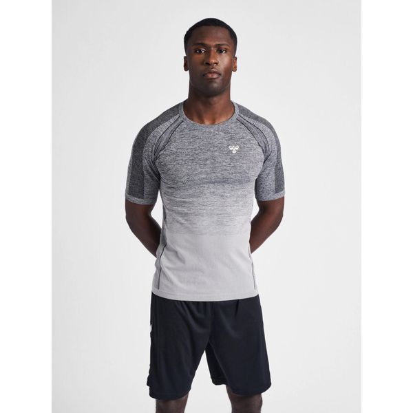 Jersey Hummel training seamless S/S. Czarne buty sportowe męskie Hummel, z jersey, bez zapięcia, na fitness i siłownię. Za 162.95 zł.