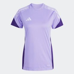 Koszulka piłkarska damska ADIDAS Tiro 25 Competition treningowa. Koszulki sportowe damskie Adidas, l, bez wzorów, sportowe, bez kołnierzyka. Za 159.99 zł.