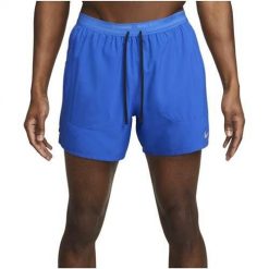 Spodnie treningowe męskie Nike Drifit Stride. Niebieskie spodnie sportowe męskie Nike, m, bez wzorów, z materiału. Za 203.00 zł.