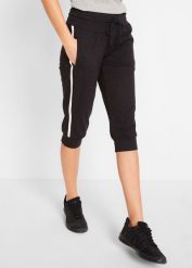 Spodnie sportowe 3/4 z bawełny. Czarne spodnie sportowe damskie bonprix, bez wzorów, z bawełny. Za 92.99 zł.