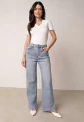 Niebieskie Szerokie Jeansy Bawełniane z Wysokim Stanem Helemenor. Niebieskie jeansy damskie Born2be, z podwyższonym stanem. Za 109.99 zł.