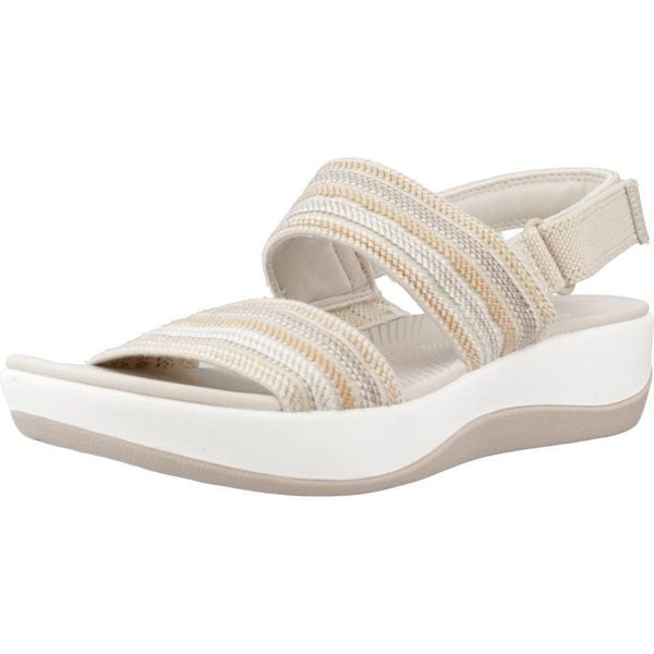 Sandały CLARKS ARLA STROLL Beżowy. Brązowe obuwie sportowe damskie Clarks, bez wzorów, z tkaniny, bez obcasa, bez zapięcia. Za 133.99 zł.