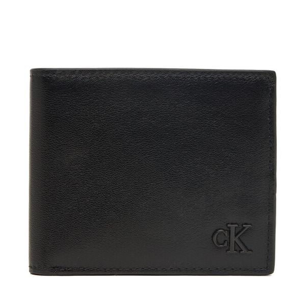 Portfel Calvin Klein. Czarne portfele męskie Calvin Klein, bez wzorów. Za 329.99 zł.