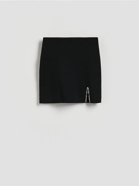 Spódnica mini z rozcięciem - czarny. Czarne spódnice damskie Reserved, l, bez wzorów, z dzianiny, mini, proste. Za 119.99 zł.