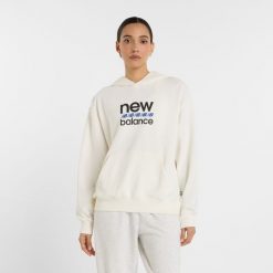 Bluza damska New Balance WT51519SST – beżowa. Brązowe bluzy damskie New Balance, xl, bez wzorów, z bawełny, bez kaptura. Za 249.99 zł.