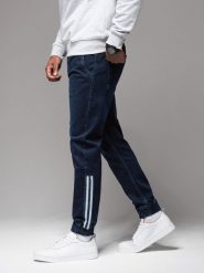 Męskie jeansowe joggery z lampasami – ciemnoniebieskie V4 OM-PADJ-0156 - XXL. Niebieskie spodnie sportowe męskie Ombre Clothing, l, bez wzorów, z bawełny. Za 161.99 zł.