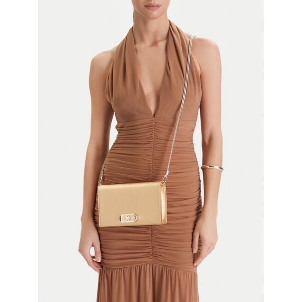 Torebka Nine West. Żółte torebki do ręki damskie Nine West, bez wzorów, wizytowe, bez dodatków. Za 154.99 zł.