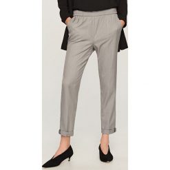 Eleganckie spodnie - Jasny szar. Spodnie materiałowe damskie marki Reserved. W wyprzedaży za 59.99 zł.
