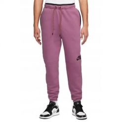 Spodnie sportowe męskie Nike Air Jordan. Czerwone spodnie sportowe męskie Nike, l, bez wzorów, z dresówki. Za 352.00 zł.