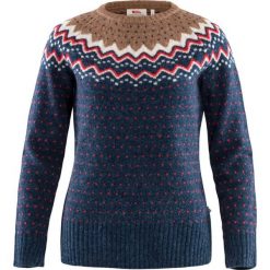 Sweter damski Fjallraven Ovik Knit Sweater. Czarne swetry damskie Fjällräven, na zimę, uniwersalny, bez wzorów, z dzianiny, klasyczne, bez kołnierzyka, bez ramiączek, długie, bez kaptura. Za 898.65 zł.