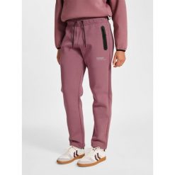 Spodnie damskie Hummel Tech. Fioletowe spodnie sportowe damskie Hummel, bez wzorów, na fitness i siłownię. Za 303.00 zł.